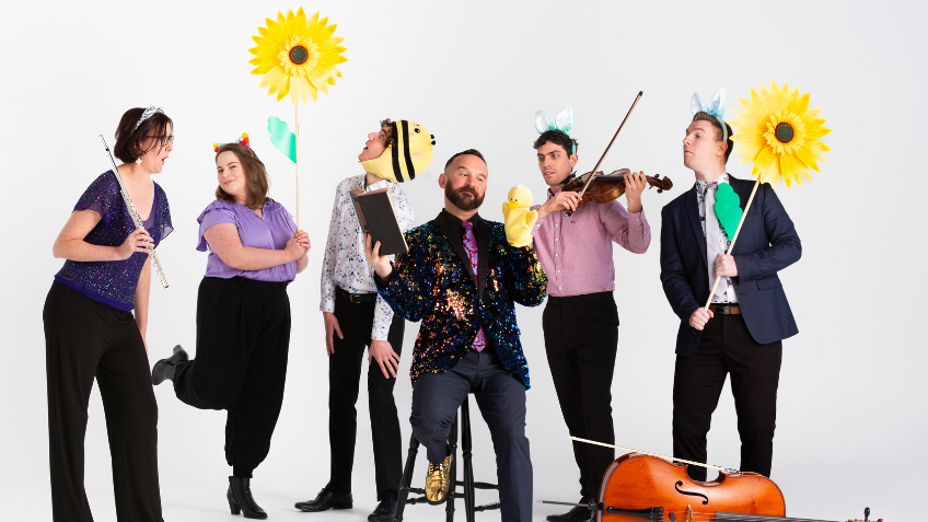 A group of musicians with sunflowers